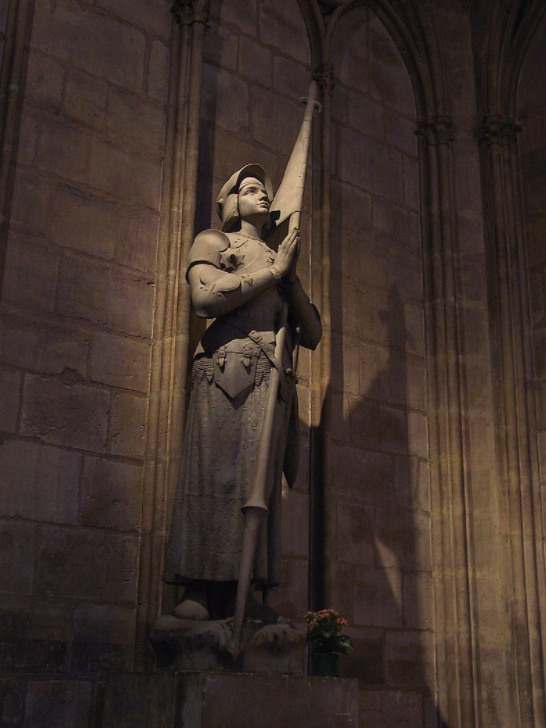 Modern statue of Joan of Arc in Notre-Dame de Paris cathedral interior, Paris