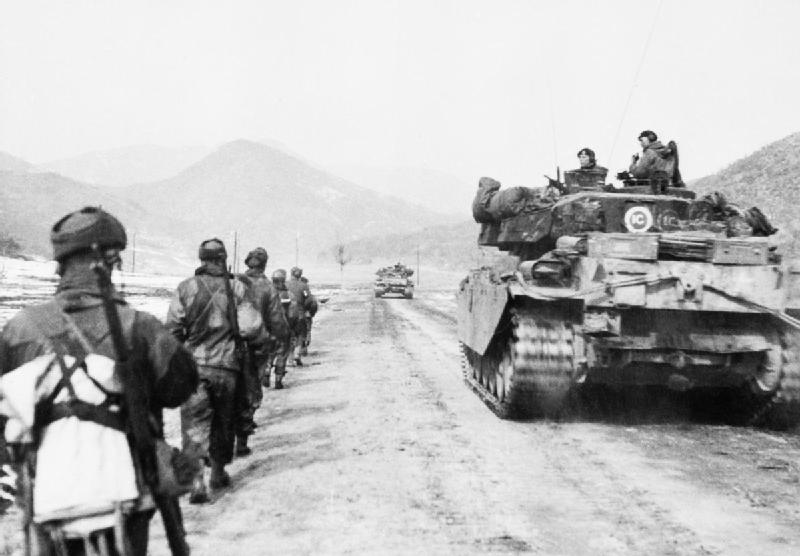 Centurion tanks and infantry of the Gloucestershire Regiment advancing to attack Hill 327 in Korea, March 1951. Centurion tanks and men of the Gloucestershire Regiment advancing to attack Hill 327 in Korea.