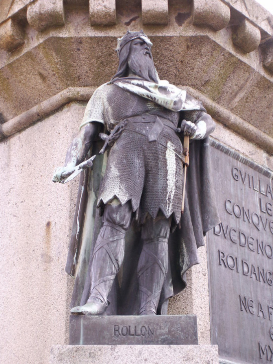 Photo of Rollon statue depicted among the 6 dukes of Normandy in the town square of Falaise