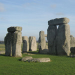 Stonehenge's ring of standing stones are set within earthworks in the middle of the most dense complex of Neolithic and Bronze Age monuments in England, including several hundred burial mounds